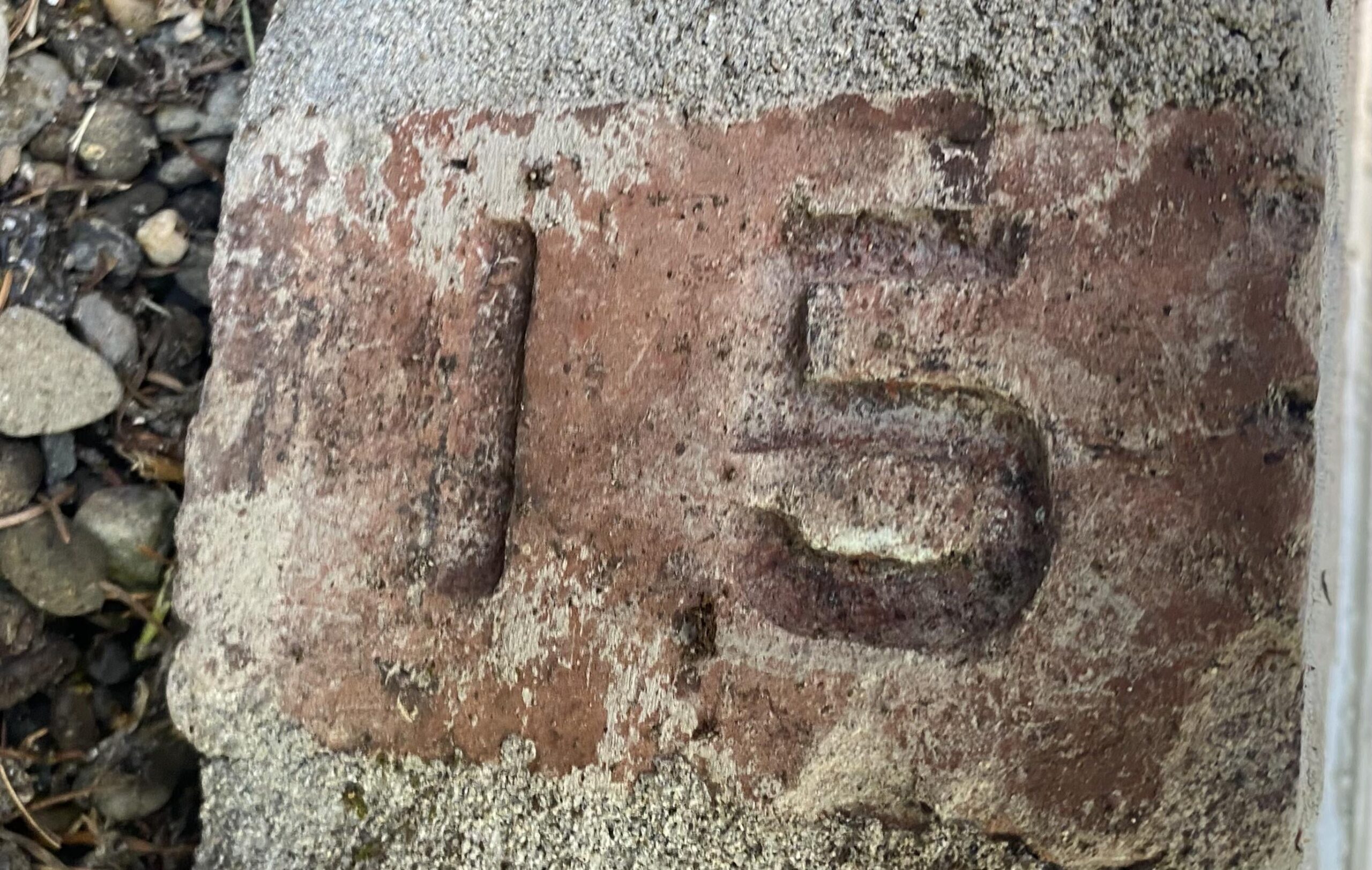 Brick in my house that says “15”